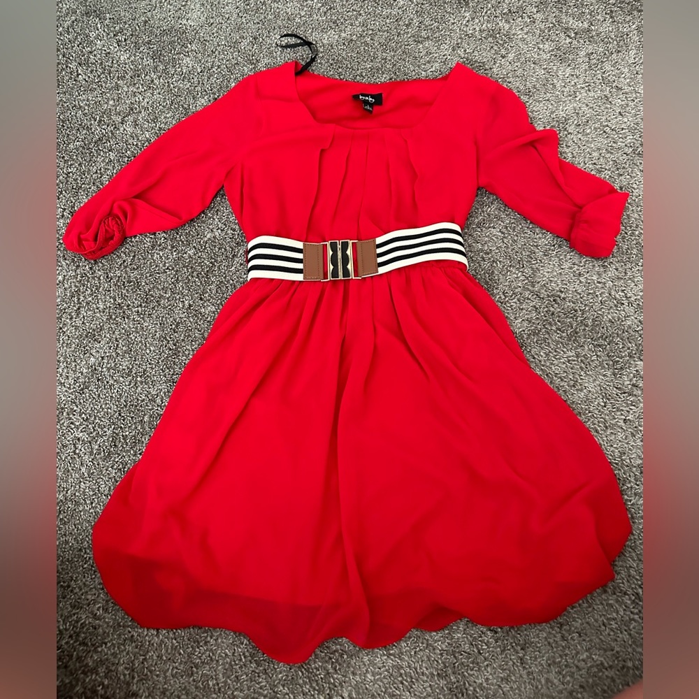 Red 3/4 sleeve dress with belt.